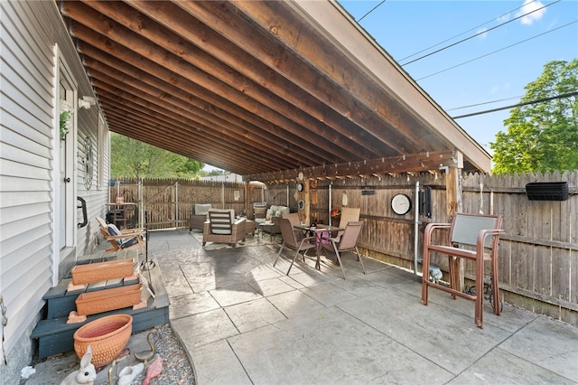 18 N Main St, Coventry, RI 02816 - fenced backyard with a patio area and an outdoor living space