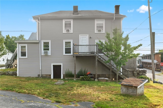 18 N Main St, Coventry, RI 02816 - rear view of property featuring a yard, stairs, and a chimney