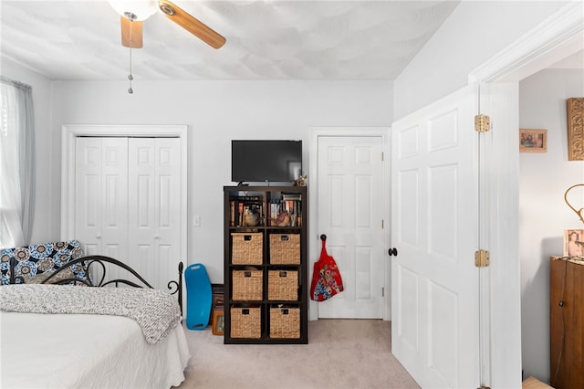 18 N Main St, Coventry, RI 02816 - bedroom with light colored carpet, a closet, and a ceiling fan