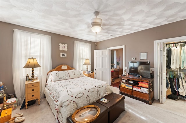 18 N Main St, Coventry, RI 02816 - bedroom featuring light carpet, a closet, and a ceiling fan