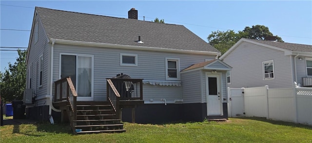 92 Silver Spring Ave, East Providence, RI 02915 - back of house featuring a chimney, a shingled roof, and a wooden deck