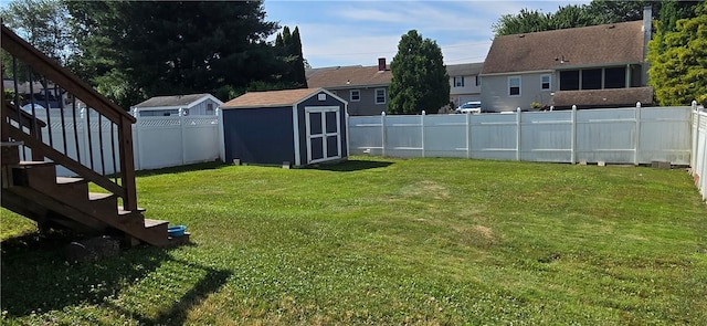 92 Silver Spring Ave, East Providence, RI 02915 - fenced backyard with a storage unit