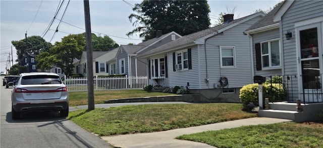 92 Silver Spring Ave, East Providence, RI 02915 - view of side of property with a chimney