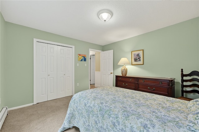 435 Allen Ave, South Kingstown, RI 02879 - carpeted bedroom featuring a closet and a baseboard heating unit