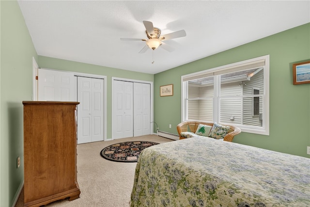 435 Allen Ave, South Kingstown, RI 02879 - carpeted bedroom with a baseboard heating unit, multiple closets, and ceiling fan