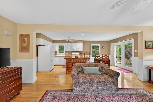 435 Allen Ave, South Kingstown, RI 02879 - living area featuring a ceiling fan, wainscoting, light wood finished floors, and recessed lighting
