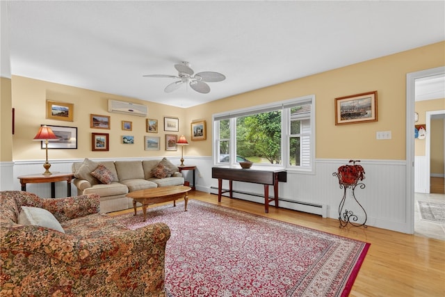 435 Allen Ave, South Kingstown, RI 02879 - living room with a baseboard radiator, a wall mounted air conditioner, a wainscoted wall, ceiling fan, and wood finished floors