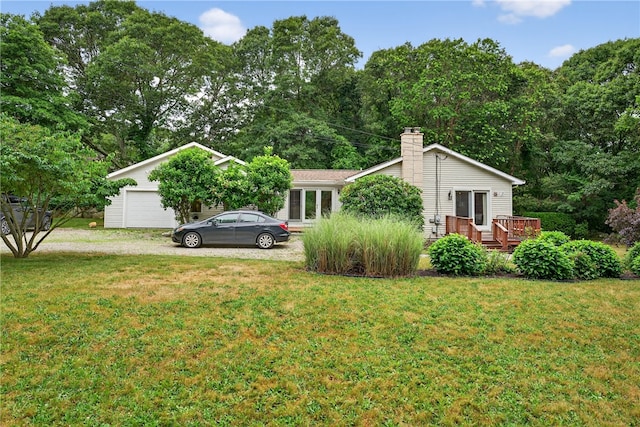 435 Allen Ave, South Kingstown, RI 02879 - view of home's exterior featuring a lawn, a deck, a chimney, and driveway