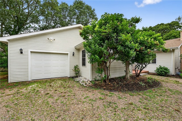 435 Allen Ave, South Kingstown, RI 02879 - view of front facade with driveway and an attached garage