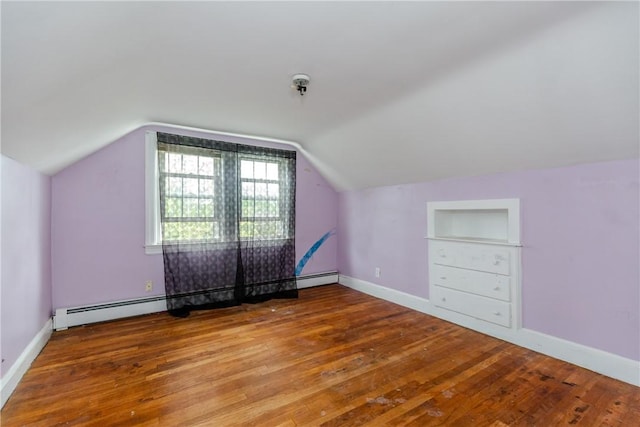36 Walton St, Providence, RI 02908 - bonus room featuring a baseboard heating unit, hardwood / wood-style floors, and vaulted ceiling