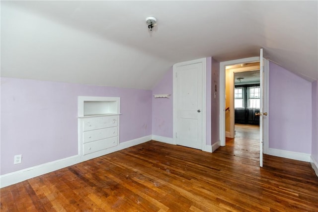 36 Walton St, Providence, RI 02908 - additional living space with vaulted ceiling, wood finished floors, and built in shelves