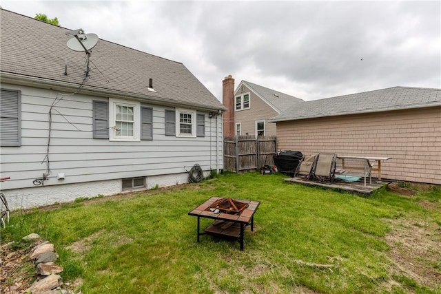 36 Walton St, Providence, RI 02908 - back of property with an outdoor fire pit