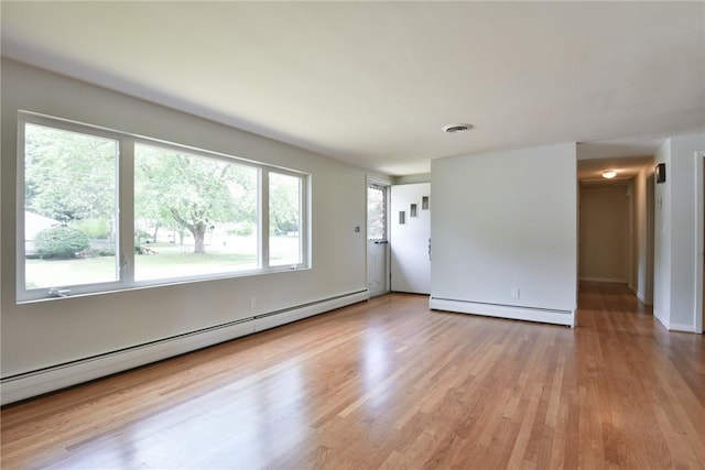 44 Cindy Ln, Warwick, RI 02886 - unfurnished room featuring a baseboard radiator and wood finished floors