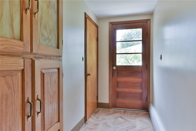 44 Cindy Ln, Warwick, RI 02886 - doorway with baseboards and baseboard heating
