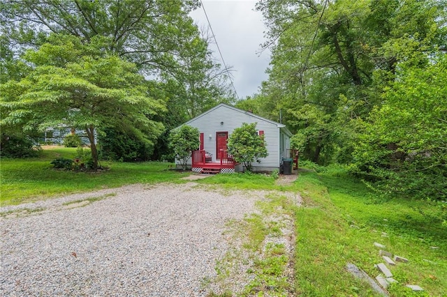 196 William Henry Rd, Scituate, RI 02857 - view of front of property with a wooden deck and gravel driveway