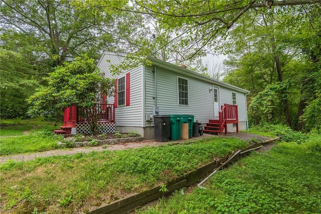 196 William Henry Rd, Scituate, RI 02857 - view of side of property with a deck
