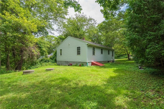 196 William Henry Rd, Scituate, RI 02857 - view of property exterior with a yard