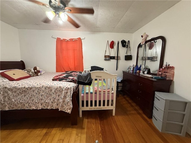 141 Pomona Ave, Providence, RI 02908 - bedroom with wood-type flooring and ceiling fan