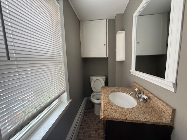 141 Pomona Ave, Providence, RI 02908 - half bath featuring vanity and a baseboard radiator