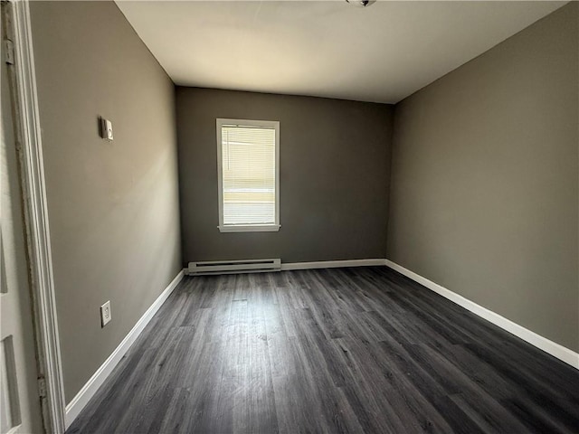 141 Pomona Ave, Providence, RI 02908 - empty room with a baseboard radiator and dark wood-style floors