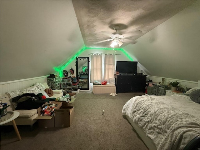 141 Pomona Ave, Providence, RI 02908 - bedroom featuring carpet floors, vaulted ceiling, a wainscoted wall, a ceiling fan, and a textured ceiling