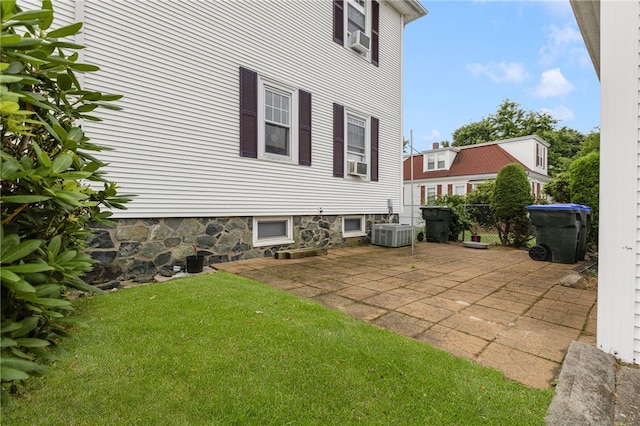 1397 Chalkstone Ave, Providence, RI 02909 - view of side of property with a patio area, a yard, and cooling unit