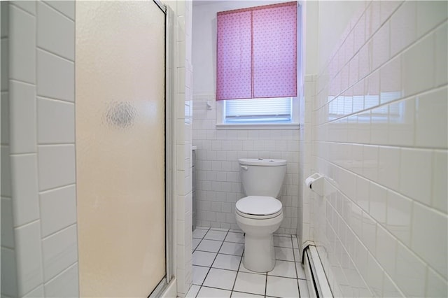 1397 Chalkstone Ave, Providence, RI 02909 - bathroom featuring tile patterned flooring, tile walls, baseboard heating, a stall shower, and a wainscoted wall