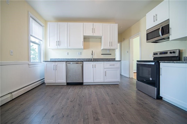 1397 Chalkstone Ave, Providence, RI 02909 - kitchen featuring stainless steel appliances, dark wood-style flooring, and white cabinetry