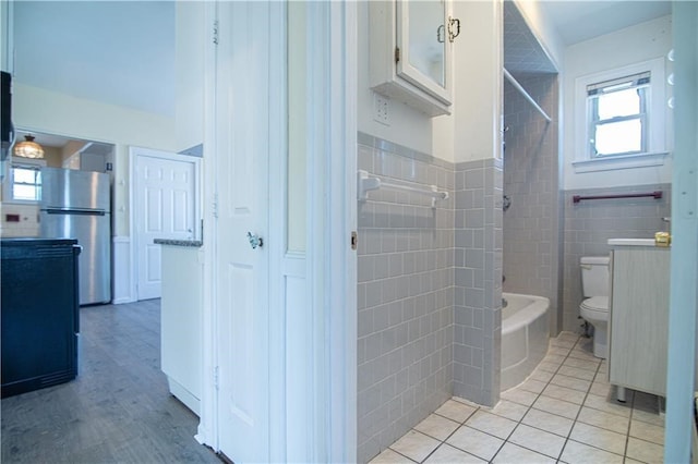 1397 Chalkstone Ave, Providence, RI 02909 - full bath featuring tile walls, shower / bath combination, vanity, and tile patterned floors