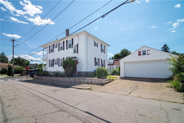 1397 Chalkstone Ave, Providence, RI 02909 - colonial house featuring an outdoor structure and a detached garage