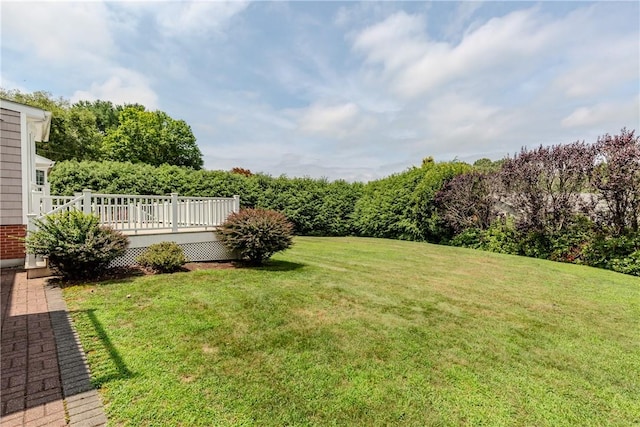11 Macintosh Dr, Smithfield, RI 02828 - view of green lawn with a wooden deck