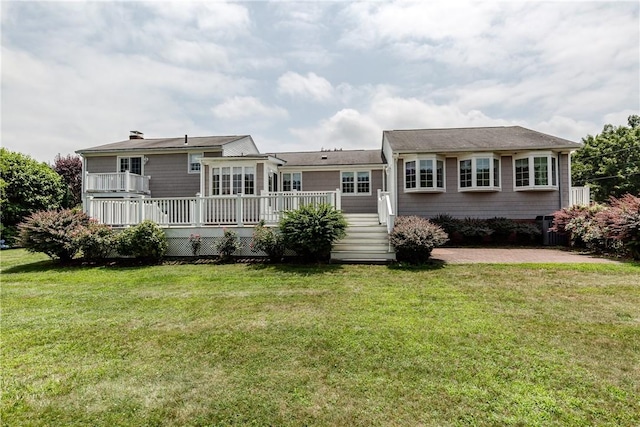 11 Macintosh Dr, Smithfield, RI 02828 - rear view of property with a yard and a deck