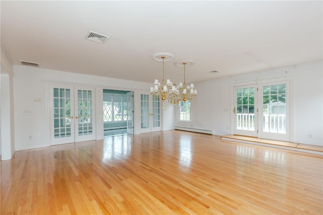 11 Macintosh Dr, Smithfield, RI 02828 - unfurnished room with a chandelier, french doors, a baseboard heating unit, and wood finished floors
