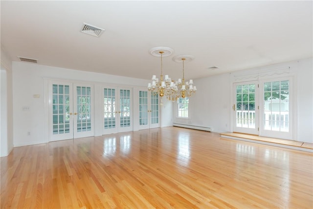 11 Macintosh Dr, Smithfield, RI 02828 - unfurnished room featuring a chandelier, a baseboard heating unit, french doors, and light wood finished floors