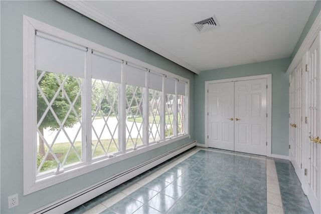11 Macintosh Dr, Smithfield, RI 02828 - unfurnished bedroom featuring a baseboard heating unit, tile patterned floors, a closet, and inlaid floor details
