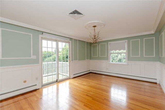 11 Macintosh Dr, Smithfield, RI 02828 - spare room featuring a decorative wall, a baseboard radiator, a chandelier, ornamental molding, and plenty of natural light