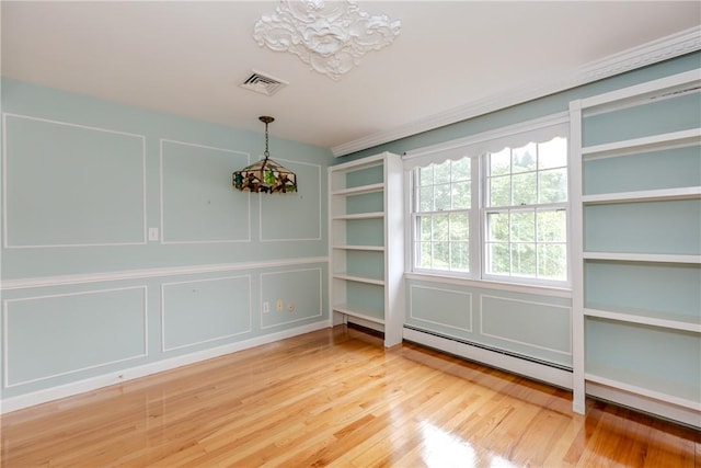 11 Macintosh Dr, Smithfield, RI 02828 - unfurnished dining area featuring a baseboard radiator, a chandelier, and wood finished floors