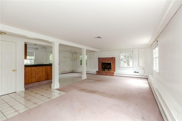 11 Macintosh Dr, Smithfield, RI 02828 - unfurnished living room featuring ornate columns, a brick fireplace, a baseboard radiator, and crown molding