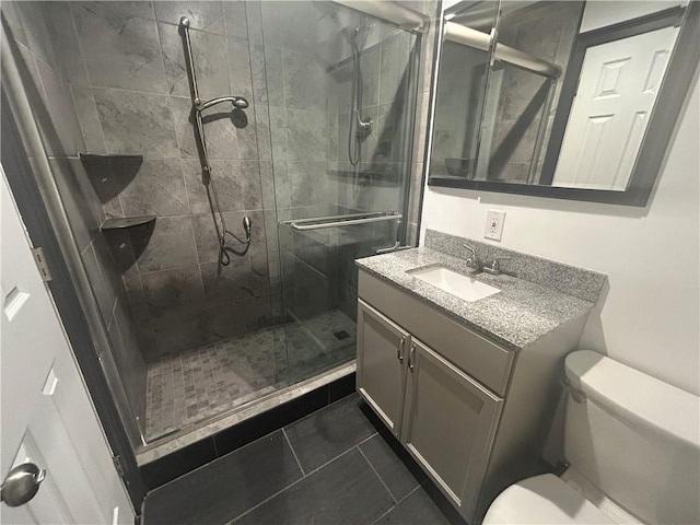 25 Bullocks Point Ave Unit 5C, East Providence, RI 02915 - bathroom with vanity, a stall shower, and tile patterned flooring