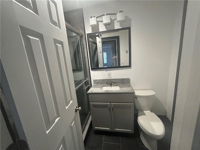 25 Bullocks Point Ave Unit 5C, East Providence, RI 02915 - bathroom with vanity, tile patterned flooring, and a shower with shower door