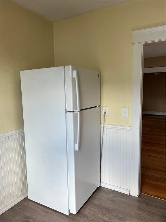 877 Central Ave, Pawtucket, RI 02861 - kitchen featuring freestanding refrigerator, wainscoting, and dark wood-type flooring