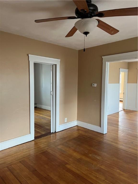 877 Central Ave, Pawtucket, RI 02861 - empty room with hardwood / wood-style flooring and ceiling fan