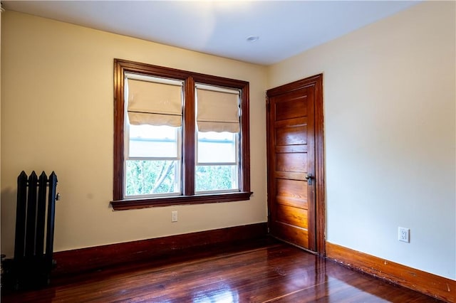 192 Lenox Ave, Providence, RI 02907 - spare room featuring radiator and wood-type flooring