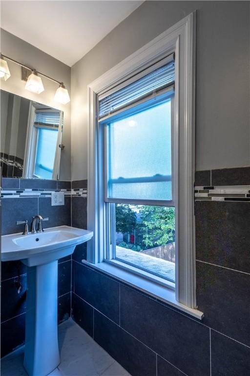 192 Lenox Ave, Providence, RI 02907 - bathroom with tile walls and a sink