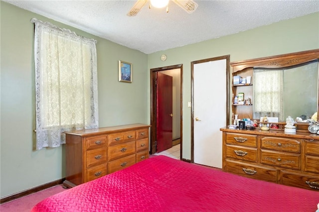 22 Parsons Ave, East Providence, RI 02914 - carpeted bedroom featuring a textured ceiling and a ceiling fan