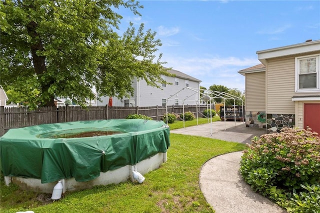 22 Parsons Ave, East Providence, RI 02914 - fenced backyard with a patio