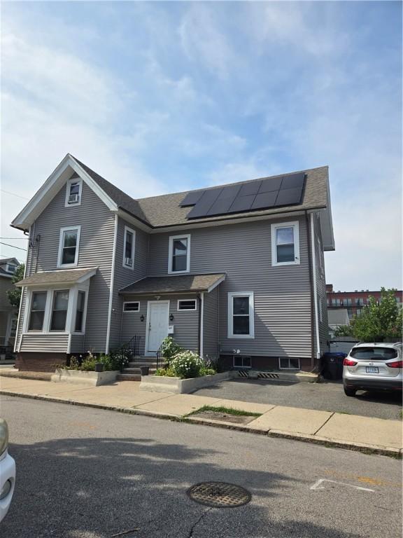 45 Harrison St, Pawtucket, RI 02860 - view of front of house with solar panels