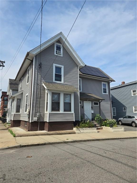 45 Harrison St, Pawtucket, RI 02860 - view of front of home with roof mounted solar panels