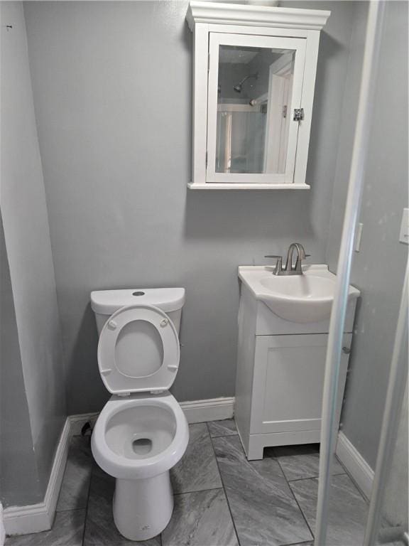 45 Harrison St, Pawtucket, RI 02860 - bathroom featuring vanity and marble finish flooring