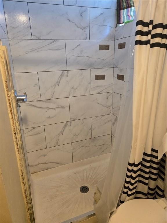 45 Harrison St, Pawtucket, RI 02860 - bathroom featuring tiled shower and toilet